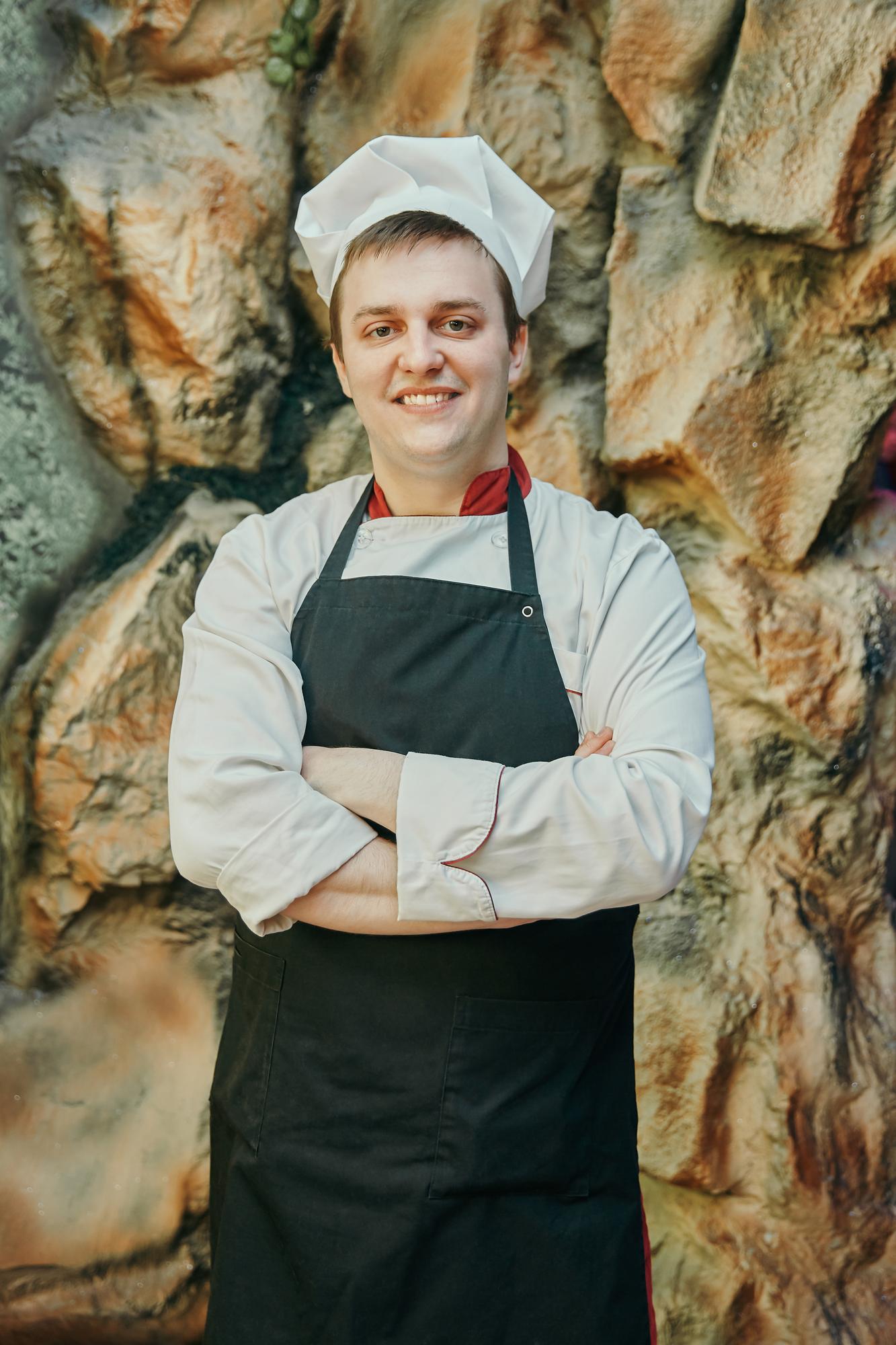 Portrait of head chef with apron